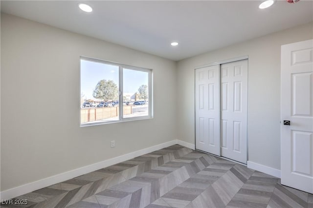 unfurnished bedroom featuring a closet