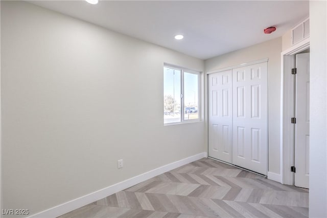 unfurnished bedroom featuring a closet