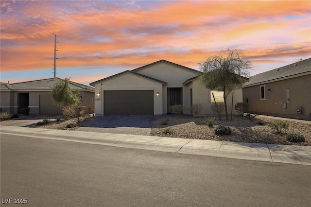 single story home featuring a garage