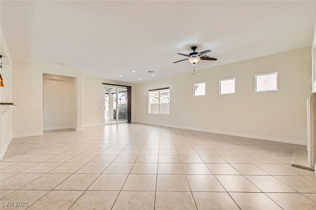 unfurnished room with light tile patterned floors, baseboards, a ceiling fan, and recessed lighting