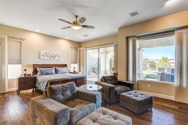 bedroom with dark wood-type flooring, access to outside, and ceiling fan