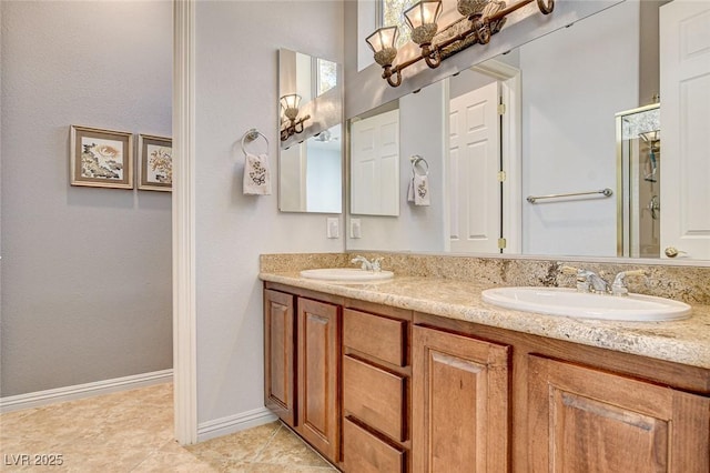 bathroom with vanity and tile patterned flooring