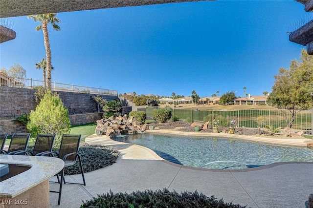 view of pool featuring a patio area