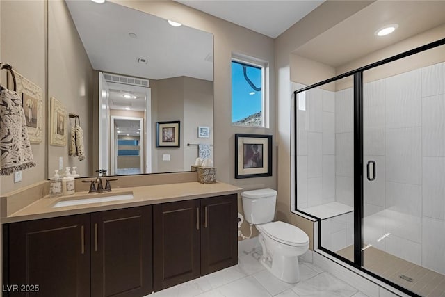 full bathroom featuring toilet, visible vents, vanity, marble finish floor, and a stall shower