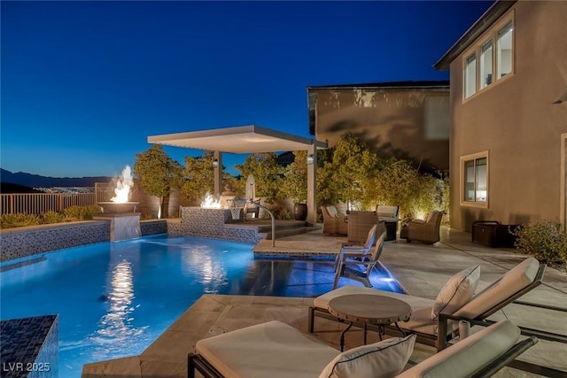 view of swimming pool featuring a fenced in pool, a patio area, fence, and an outdoor hangout area