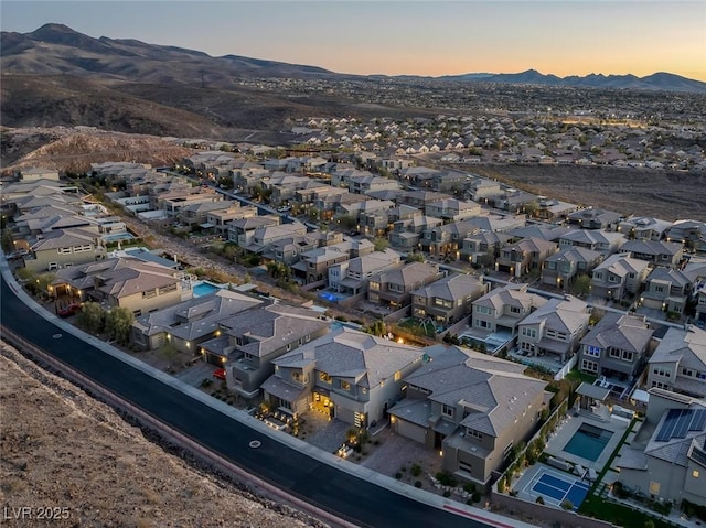 bird's eye view with a mountain view and a residential view