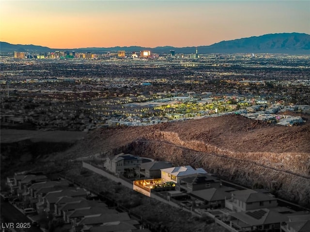 aerial view at dusk with a mountain view