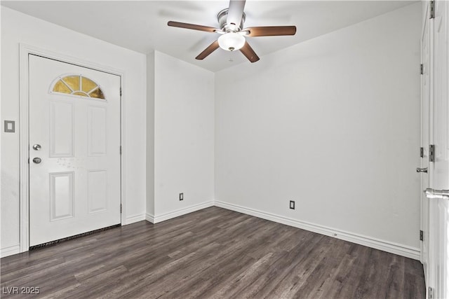 foyer featuring dark wood-type flooring and ceiling fan