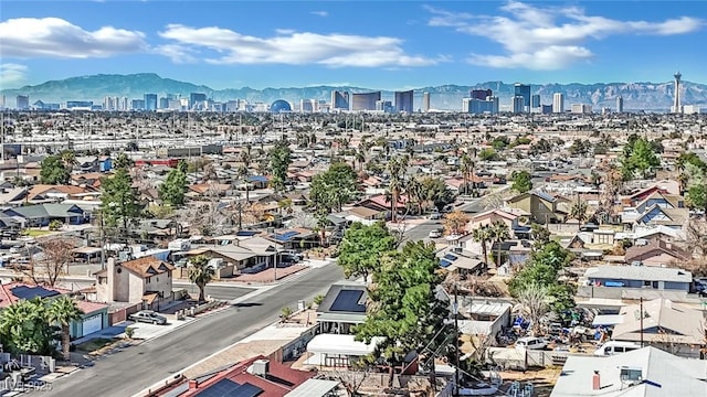 aerial view featuring a mountain view and a city view