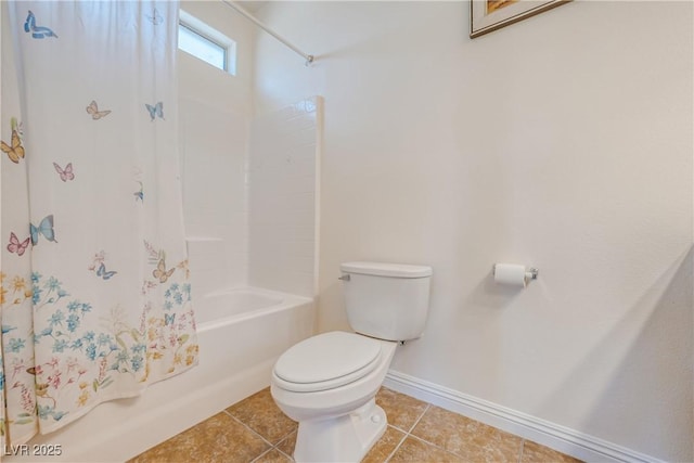 bathroom with tile patterned flooring, shower / bathtub combination with curtain, and toilet