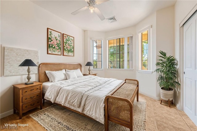 bedroom with a closet and ceiling fan