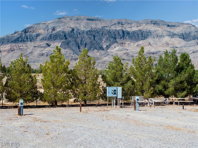 mountain view featuring a rural view