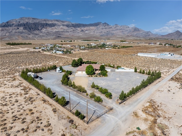 bird's eye view featuring a rural view and a mountain view