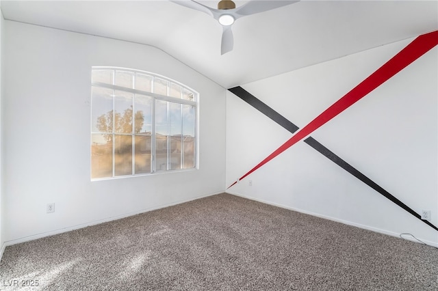 carpeted spare room with lofted ceiling and ceiling fan