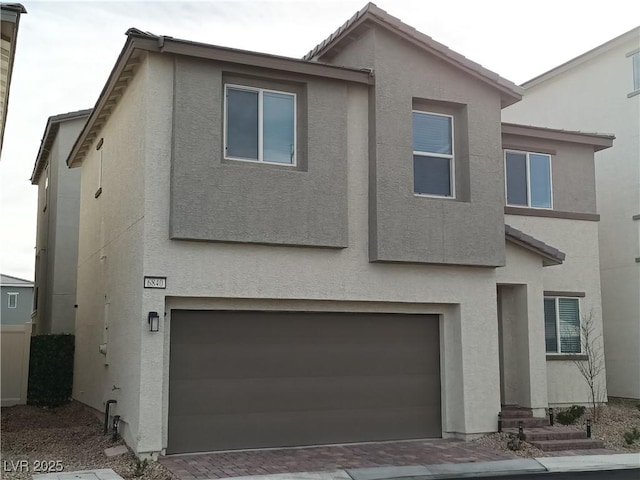 view of front of property featuring a garage