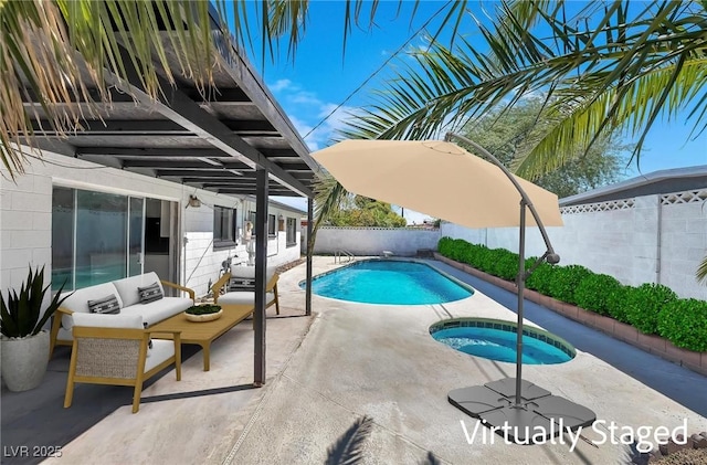 view of pool with an in ground hot tub, outdoor lounge area, and a patio