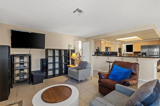 tiled living room with sink