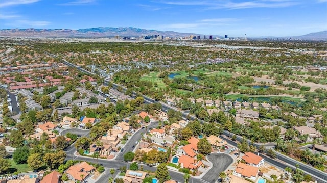 birds eye view of property with a mountain view