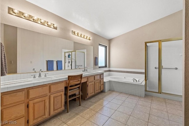 bathroom featuring lofted ceiling, vanity, independent shower and bath, and tile patterned flooring