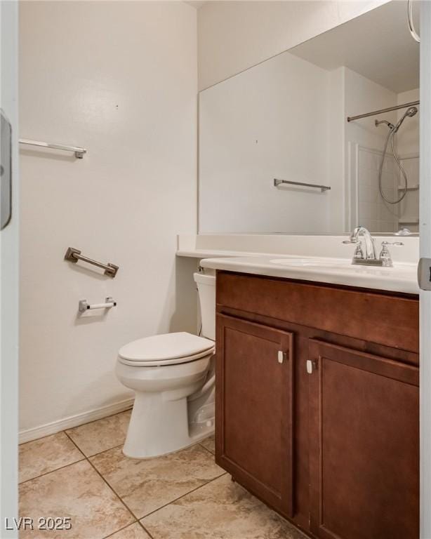 full bathroom with vanity, baseboards, tile patterned flooring, a shower, and toilet