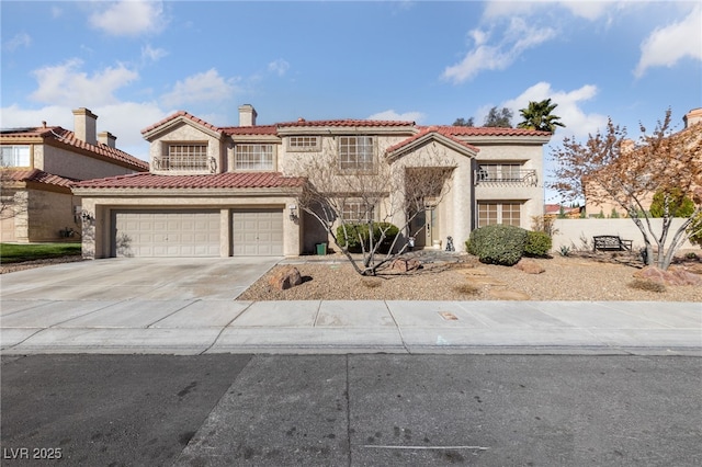 mediterranean / spanish-style home with driveway, a balcony, a tiled roof, an attached garage, and stucco siding