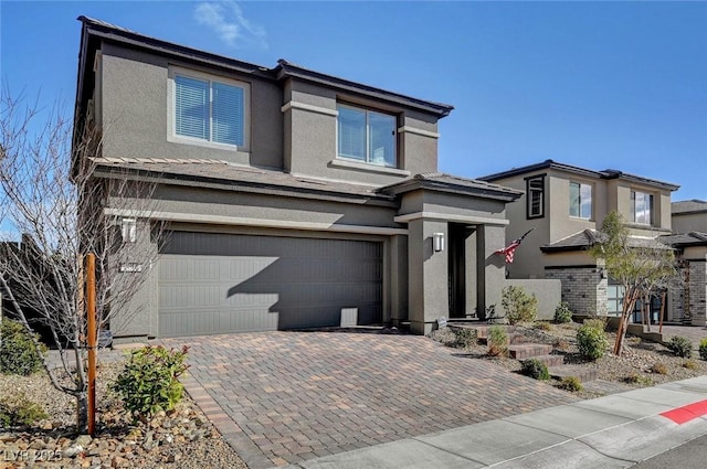 view of front of property with a garage