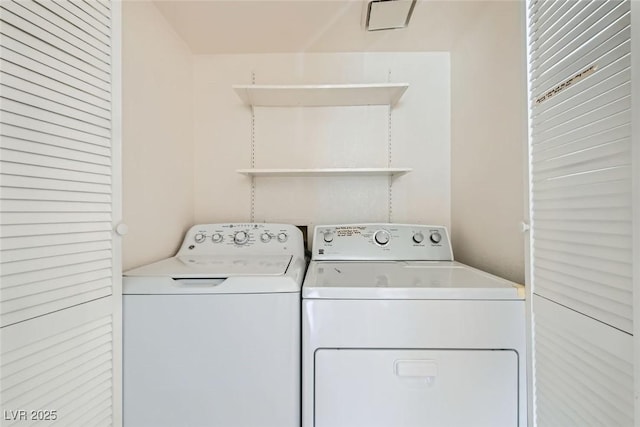 laundry room featuring washing machine and dryer