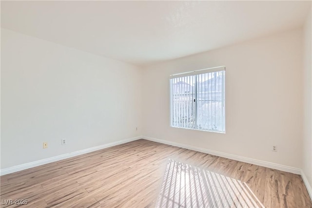 unfurnished room featuring light hardwood / wood-style flooring