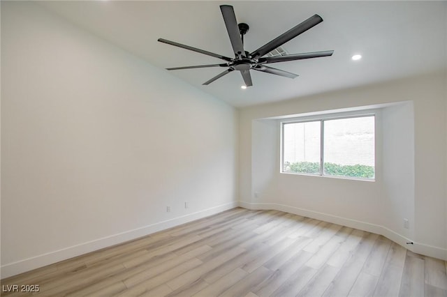 spare room featuring recessed lighting, baseboards, light wood finished floors, and ceiling fan