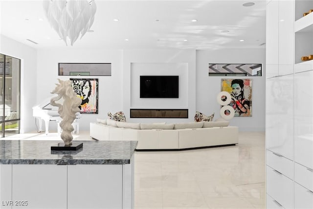 1455 Macdonald Ranch Dr, Henderson, NV 89012 - living room with recessed lighting and light marble finish flooring
