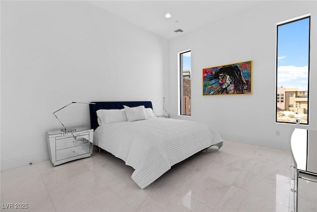 bedroom with recessed lighting, visible vents, and baseboards