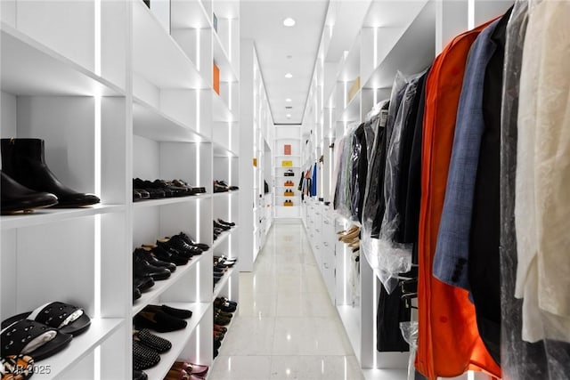 walk in closet featuring light tile patterned floors