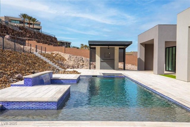 view of swimming pool featuring a fenced in pool, a patio area, fence, and stairway