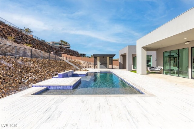 view of swimming pool with a patio area, a fenced backyard, a jacuzzi, and a fenced in pool