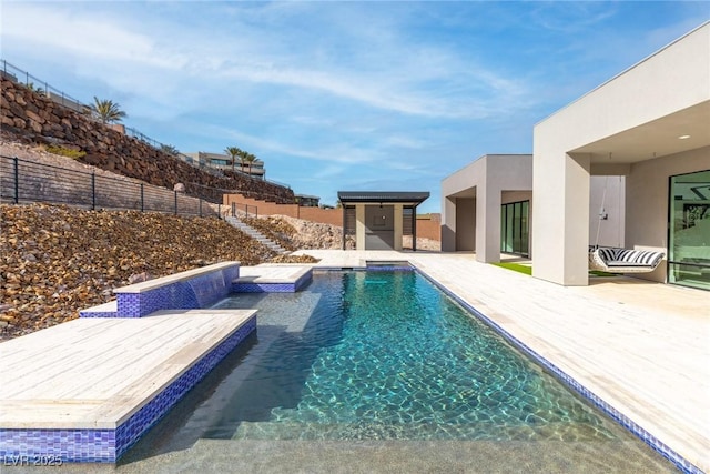 view of swimming pool with a fenced in pool, a patio area, and a fenced backyard