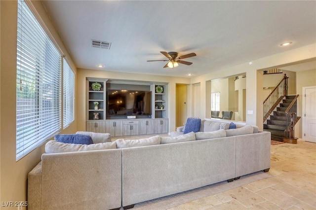 living room with ceiling fan