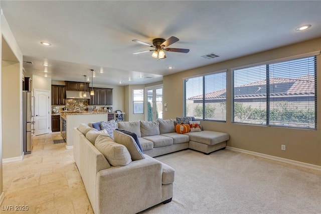 living room with ceiling fan