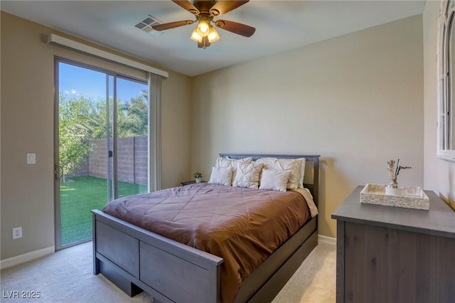 carpeted bedroom with ceiling fan and access to exterior