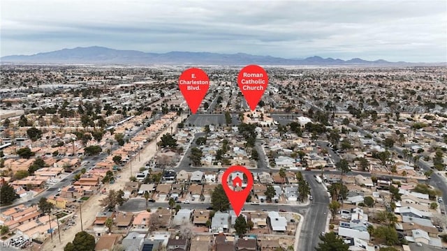 bird's eye view with a residential view and a mountain view