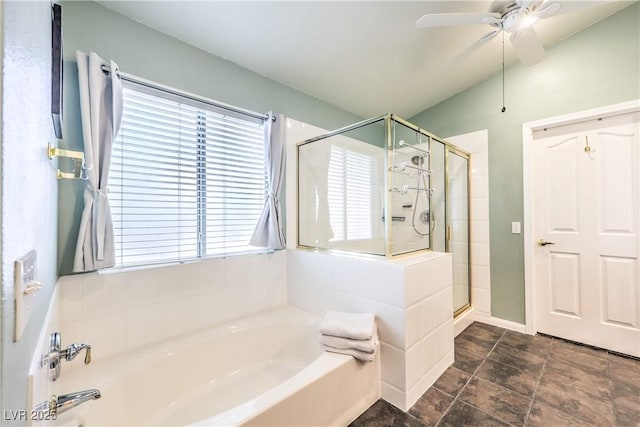 full bathroom with a stall shower, a garden tub, and a ceiling fan