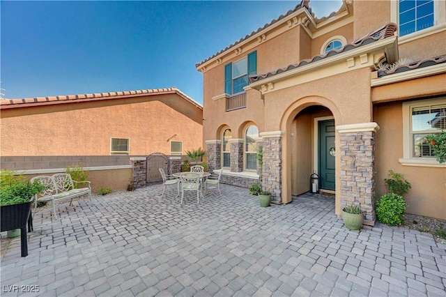 view of patio / terrace with fence