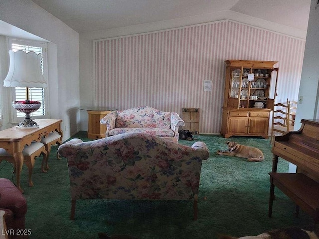 living area featuring lofted ceiling and carpet floors