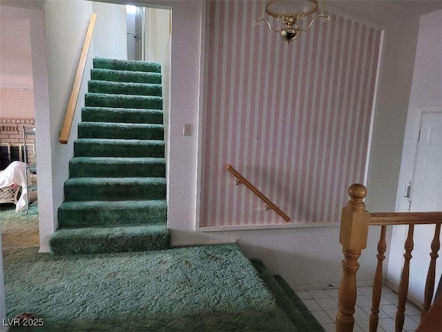 stairs featuring tile patterned flooring