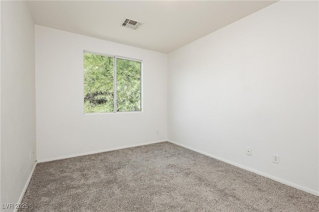 view of carpeted spare room