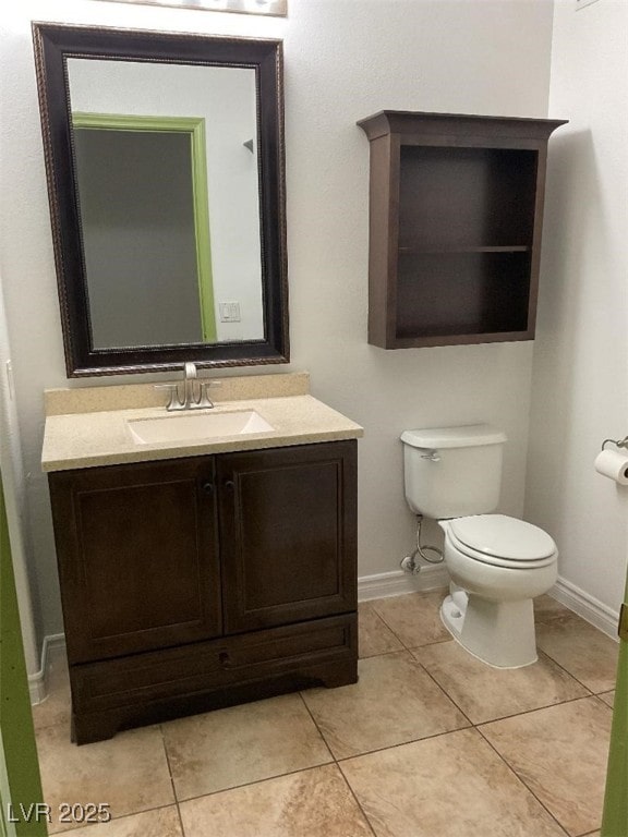 75 N Valle Verde Dr Unit 621, Henderson, NV 89074 - half bath featuring toilet, vanity, tile patterned flooring, and baseboards
