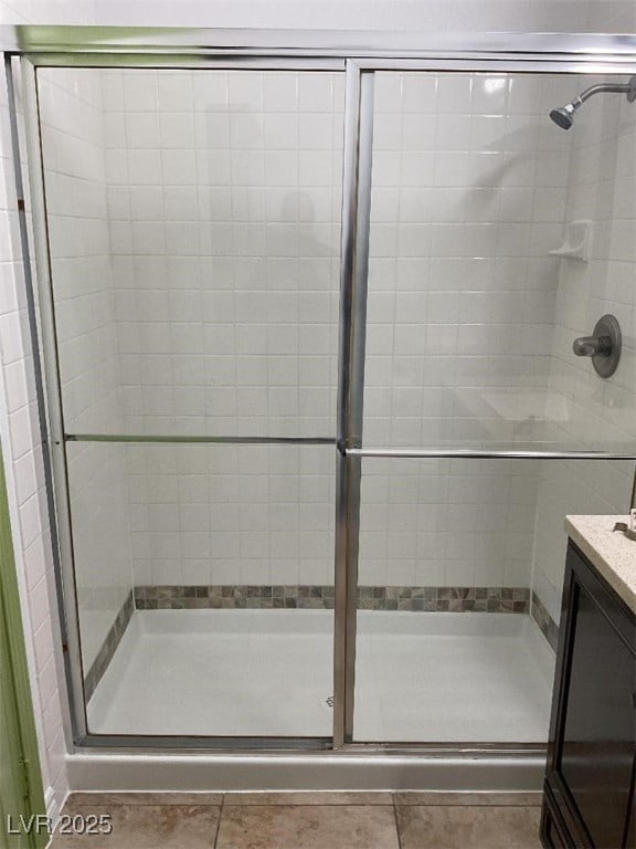 75 N Valle Verde Dr Unit 621, Henderson, NV 89074 - bathroom with a shower stall, tile patterned flooring, and vanity