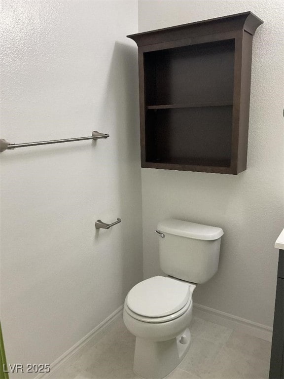 75 N Valle Verde Dr Unit 621, Henderson, NV 89074 - bathroom with toilet, baseboards, vanity, and tile patterned floors