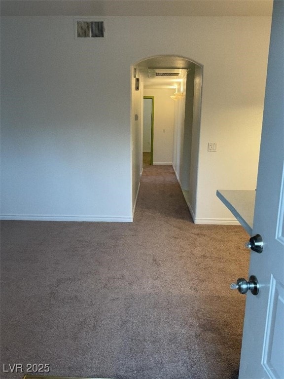 75 N Valle Verde Dr Unit 621, Henderson, NV 89074 - carpeted spare room featuring arched walkways and baseboards