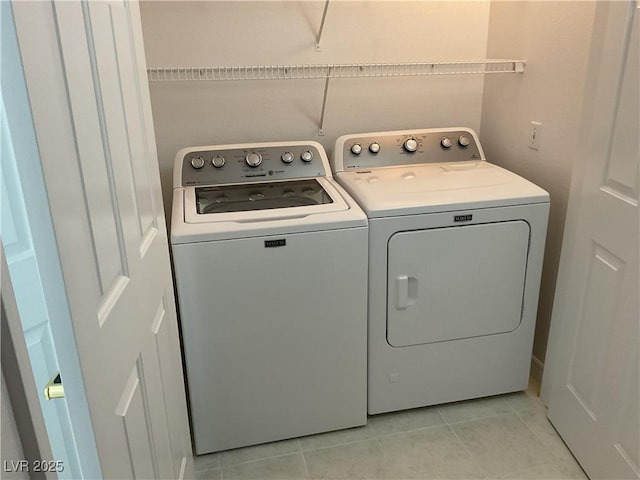 75 N Valle Verde Dr Unit 621, Henderson, NV 89074 - laundry area with washing machine and clothes dryer and light tile patterned flooring