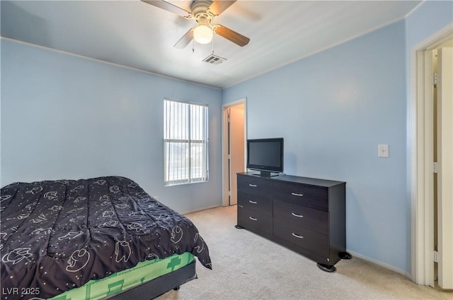 bedroom with light carpet and ceiling fan